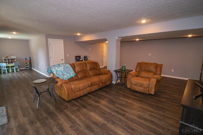 Lower level Recreation and Gaming Area. Walkout to the stamped, embossed patio. | Image 7