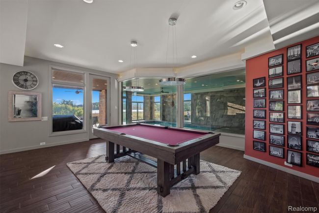 Recreation room featuring billiards table, dark wood-style floors, and recessed lighting | Image 50