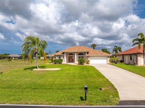 1054 Boundary Blvd, ROTONDA WEST, FL, 33947-2876 | Card Image