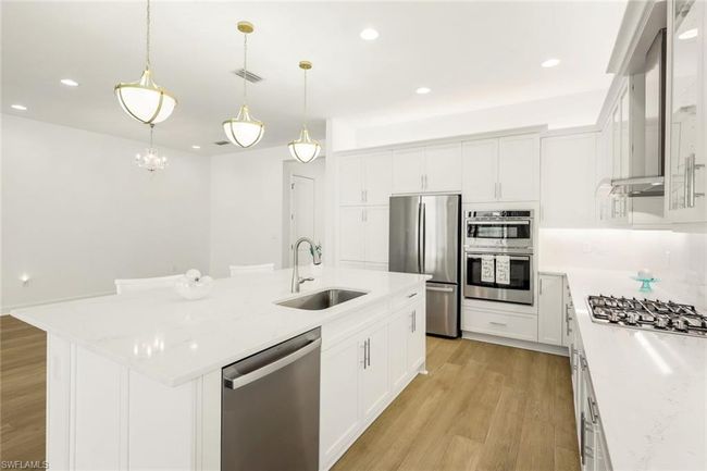 12243 Lotus Ave, House other with 3 bedrooms, 3 bathrooms and 2 parking in NAPLES FL | Image 6