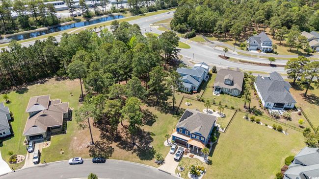 Drone / aerial view featuring a water view and a residential view | Image 36