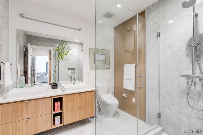 Get the spa treatment in your very own primary bathroom. | Image 33