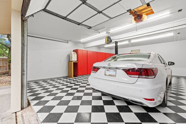 Garage featuring a garage door opener | Image 25