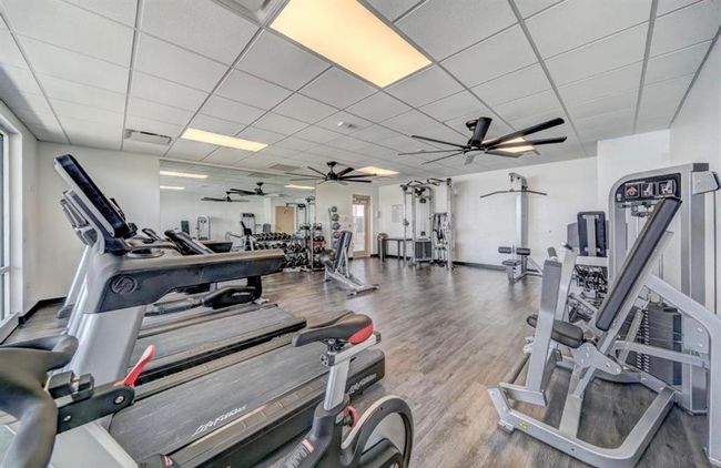 Experience the ultimate workout space with top-of-the-line equipment right at home. | Image 29