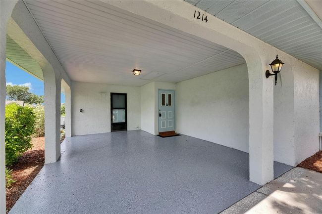 Freshly sealed & painted carport | Image 5