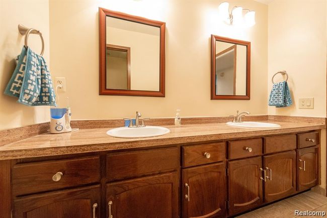 Bathroom featuring double vanity | Image 28