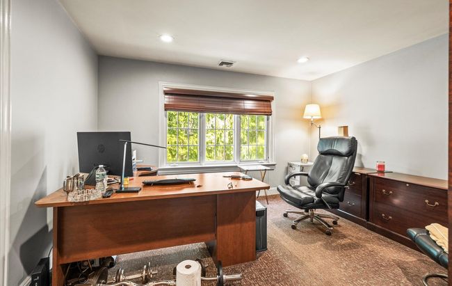 Office area with baseboards, light colored carpet, and recessed lighting | Image 26