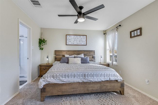 Carpeted bedroom with baseboards and ceiling fan | Image 13