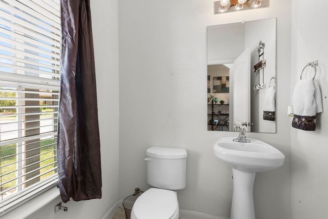 Bathroom with baseboards and toilet | Image 31