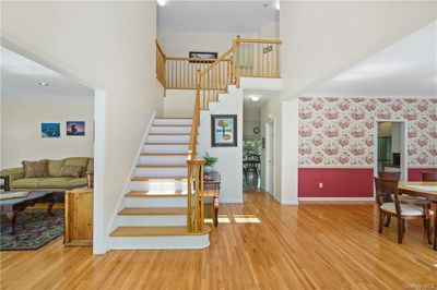 Front foyer with living room on left, dining room on right | Image 3