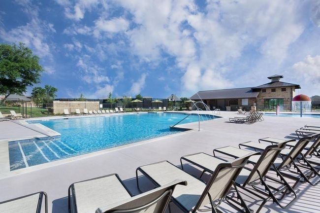 Community pool featuring a patio | Image 31