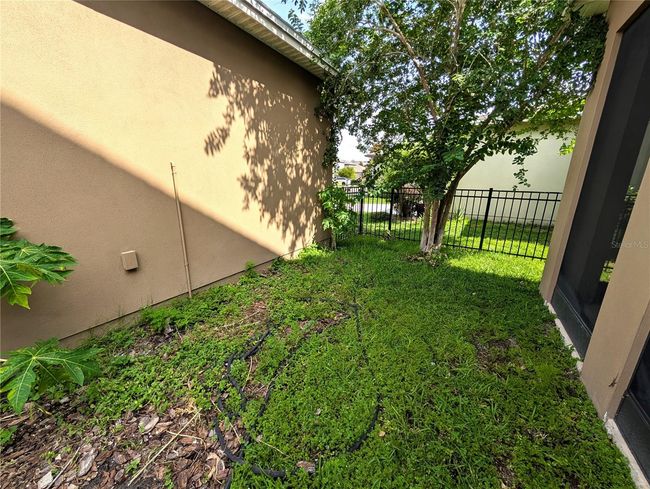 Fenced backyard | Image 19