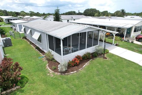 489 Tarpon Dr, Barefoot Bay, FL, 32976-2550 | Card Image