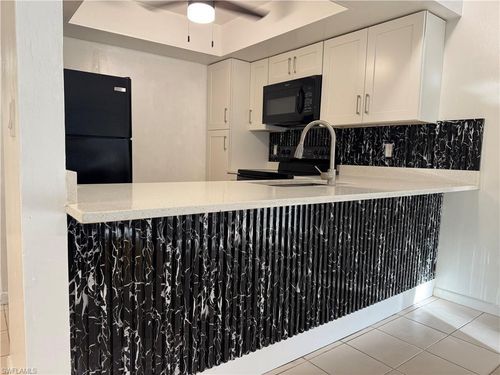 23-2201 E 5th St, LEHIGH ACRES, FL, 33936-4300 | Card Image
