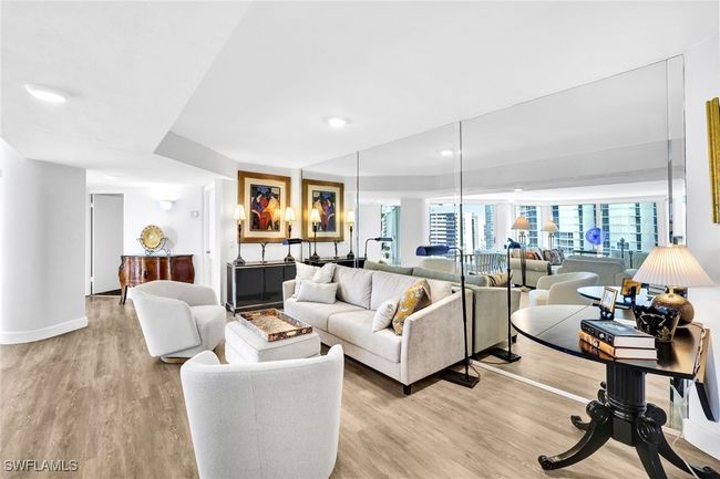 Living room with recessed lighting, light wood finished floors, and baseboards | Image 9