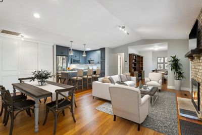 Welcome to your dream townhome! This beautiful one-level residence offers the perfect blend of style, comfort, and convenience. Featuring an open-concept layout, this home creates a warm & inviting atmosphere for relaxation & entertaining. | Image 1