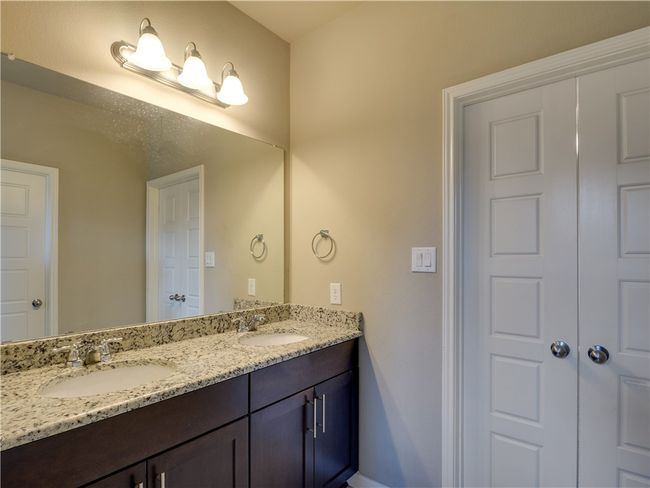 Master bedroom with double vanity. | Image 14