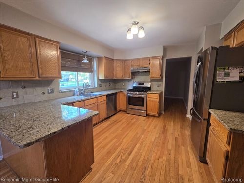 2057 Huntingdon Dr, Wixom, MI, 48393-1165 | Card Image