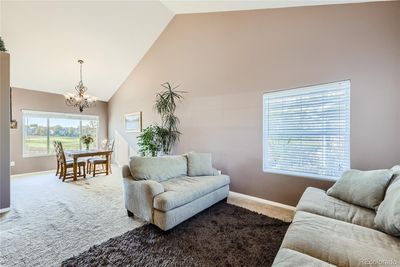 Open and airy living room with vaulted ceilings! | Image 3