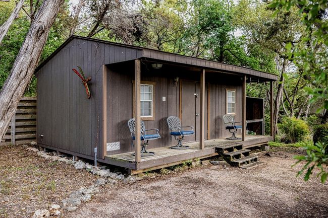 Outdoor shed, nestled in trees in backyard, currently set up as a podcast/creator studio but also perfect for another office, workshop or gym | Image 39