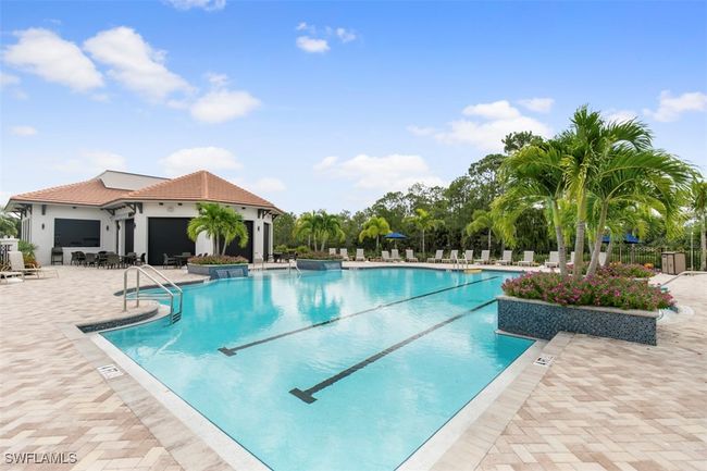 Community pool featuring a patio area | Image 36