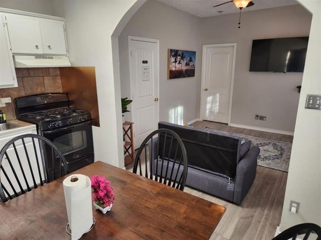 Cozy dining space in a charming 1-bedroom unit, perfect for intimate meals and gatherings. | Image 23