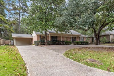 Notice the carport and 2 car garage. | Image 3