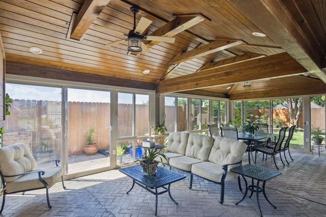 This fabulous enclosed patio is heated and cooled with it's own mini-split unit. | Image 37