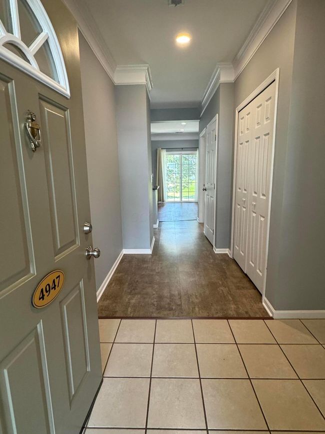 Front entry - ceramic, looking toward the back patio slider - passing the entry closet and the large storage closet | Image 9
