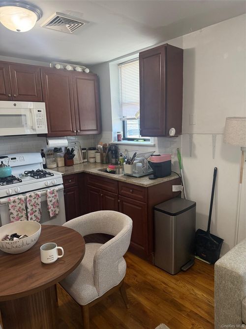 1217 Jericho Tpke, New Hyde Park, NY, 11040-4612 | Card Image