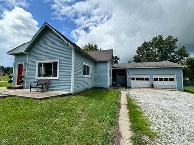 Lots of room for parking in front of the oversized garage/workshop | Image 2