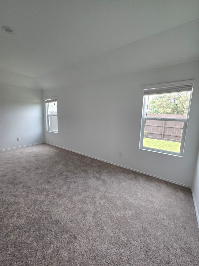 Spare room featuring carpet | Image 13