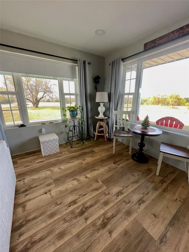 Dining space featuring wood finished floors | Image 8