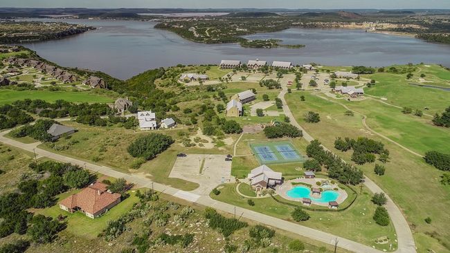 Aerial view of the amenities area (photo taken before recent painting at the pool house). | Image 7