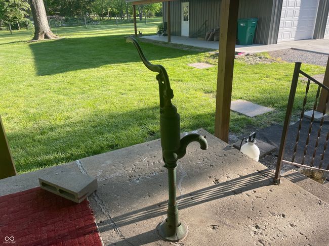 Hand pump on the back porch is functional if the cistern underneath is filled from the gutters--currently not used though | Image 34