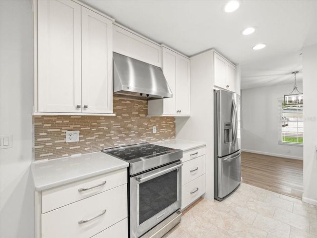 4016 Windtree Dr, House other with 4 bedrooms, 2 bathrooms and null parking in Tampa FL | Image 5