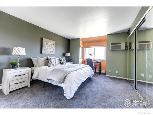 Upper primary bedroom with Flatiron views from the private balcony. | Image 15