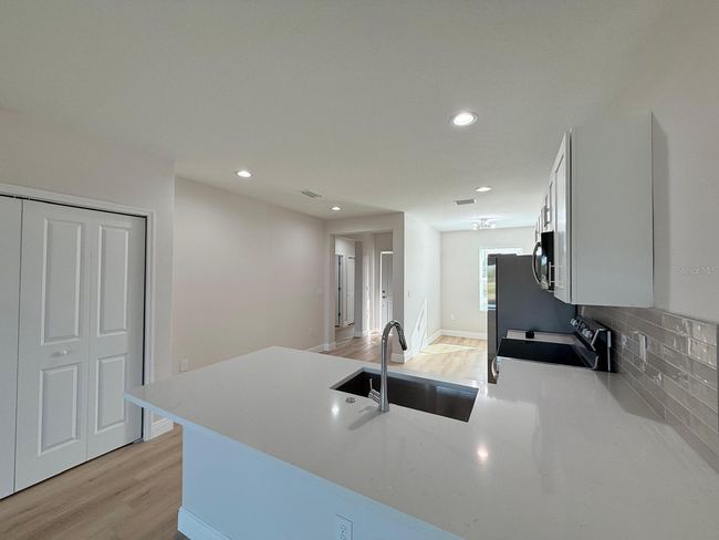 12223 Kirk Ave, Home with 6 bedrooms, 4 bathrooms and null parking in Port Charlotte FL | Image 26