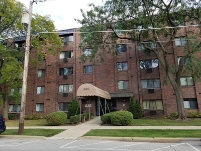 410 - 835 Pearson Street, Condo with 1 bedrooms, 1 bathrooms and 1 parking in Des Plaines IL | Image 1