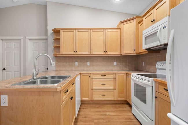 101 Sunvale Crescent Ne, Townhouse with 2 bedrooms, 2 bathrooms and 4 parking in High River AB | Image 7
