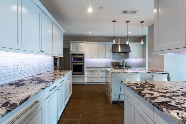 Abundance of counter & cabinet space. | Image 18