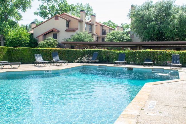 Community pool featuring a patio area | Image 21