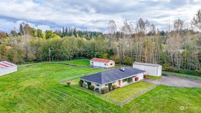 4.85 acres of beautiful pasture with large 3 bedroom rambler and 3 outbuildings | Image 1