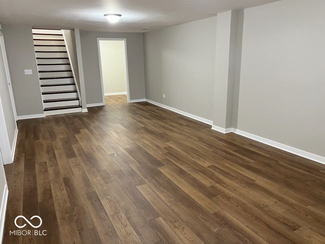 13'x27 lower level family room with large walk in closet | Image 12