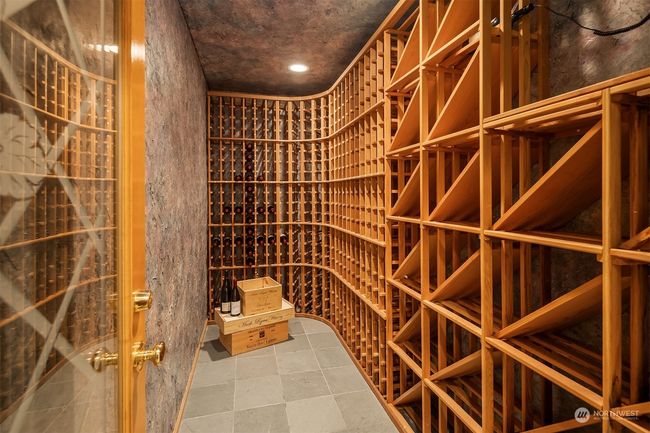 Temperature controlled Wine cellar holds over 700 bottles. | Image 29