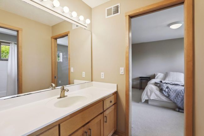Jack and Jill bathroom accents this fantastic custom home with thoughtful design features throughout. . | Image 29