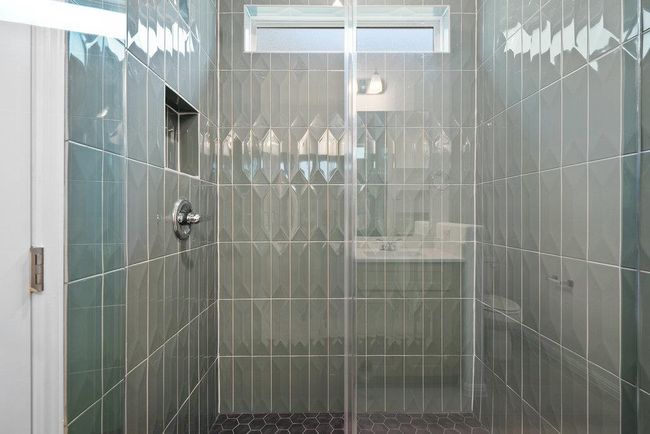Bathroom featuring a stall shower | Image 19