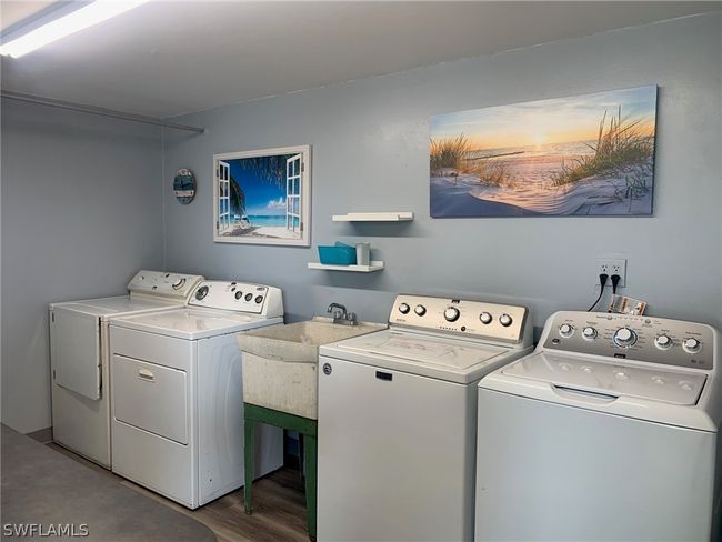 2 Washers & 2 Dryers on each level are free to use | Image 21