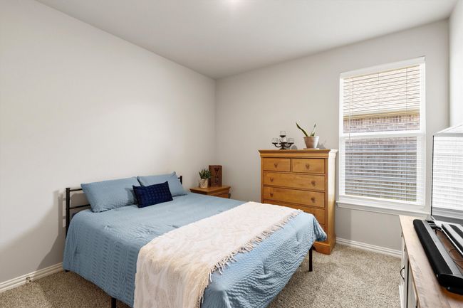 Bedroom with carpet floors | Image 17