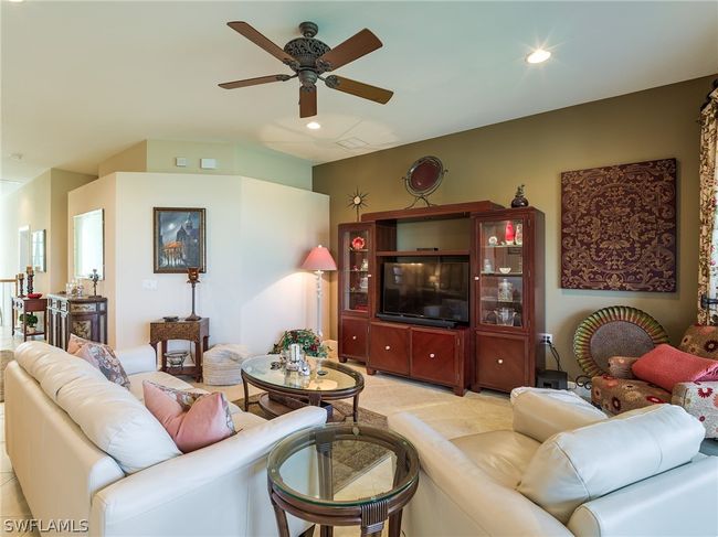 Living room with ceiling fan | Image 4